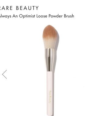 Rare Beauty Loose Powder Brush in Light Pink Handle with Beige-Tipped Bristles